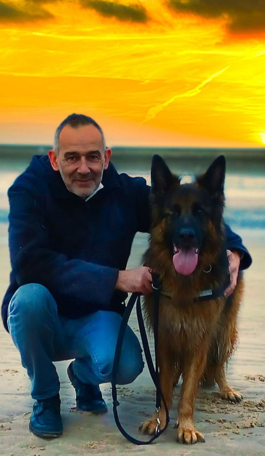 Paul Duxbury and his German Shepherd Dog Rockstar, founder of Double Glazing Repairs Fleetwood.