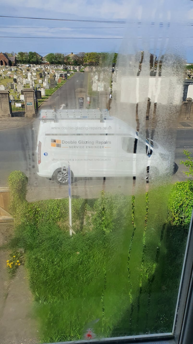 failed double glazing unit, misted with condensation inside