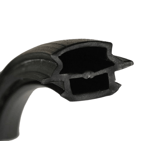 uPVC Door seals and gaskets.  alt image The image shows a close-up view of a cross-section of a rubber or plastic sealing strip. The strip has a complex profile with multiple chambers and a central support structure, which is likely designed to provide flexibility and sealing capabilities. This type of sealing strip is commonly used in automotive or industrial applications to create airtight or watertight seals between surfaces. The intricate design of the profile highlights the engineering involved in creating effective seals for various applications.