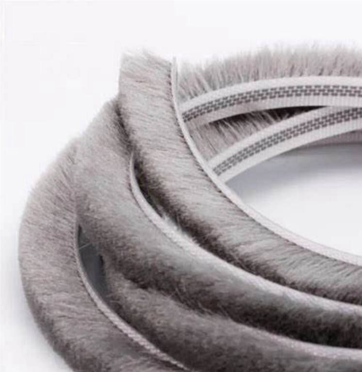Image shows Wool pile draught seal which are a great way to keep your home warm and draft-free! They are typically used around the edges of doors and windows to provide a barrier against cold air, water, noise, and smoke. For composite doors, you can find wool pile draught seals in various sizes and types